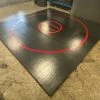 AK Athletic Equipment CLEARANCE 12' X 12' X Ultra Shock Roll Up Wrestling Mat - Black With Red Circles -Tumbl Trak shop 12x12ultrashockblackwithredcircles scaled