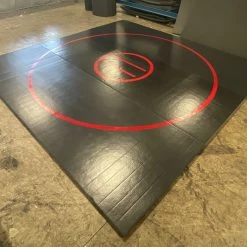 AK Athletic Equipment CLEARANCE 12' X 12' X Ultra Shock Roll Up Wrestling Mat - Black With Red Circles