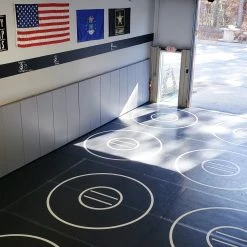 AK Athletic Equipment Black And Red 8 Section 20' X 20' X 1 3/8" Roll-Up Wrestling Mat With Four Practice Circles -Tumbl Trak shop wrestlingmatinwresltingroom scaled